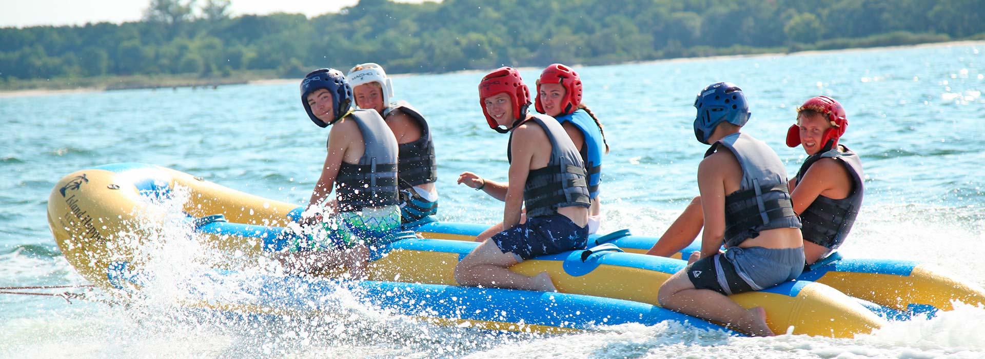 Banana boat at YMCA Camp Silver Beach, teens in the Atlantic, water sports